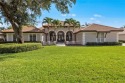 This stunning Estate pool home in Wildcat Run sits on the 11th for sale in Estero Florida Lee County County on GolfHomes.com