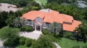 With gorgeous Classical Revival architecture, this estate sits for sale in Windermere Florida Orange County County on GolfHomes.com