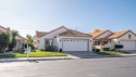 This darling home adorns a winding street in the tightly-knit for sale in Menifee California Riverside County County on GolfHomes.com