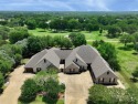 Welcome to your dream home on the #4 hole of White Bluff Golf for sale in Whitney Texas Hill County County on GolfHomes.com