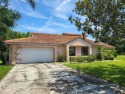 WELCOME TO THE DESIRABLE COMMUNITY OF ORANGE TREE.  TUCKED AWAY for sale in Orlando Florida Orange County County on GolfHomes.com