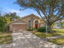 Welcome to the lovely community of Eagle Cove, nestled in the for sale in Palm Harbor Florida Pinellas County County on GolfHomes.com