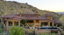 This one-of-a-kind mountainside Villa is located on an acre+ for sale in Buckeye Arizona Maricopa County County on GolfHomes.com