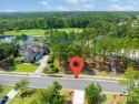 Nestled within the pristine landscape of a signature Nicklaus for sale in Southport North Carolina Brunswick County County on GolfHomes.com
