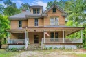 RARE FIND! CLASSIC 1905 FARMHOUSE on 3.2 private, wooded acres for sale in Hendersonville North Carolina Henderson County County on GolfHomes.com