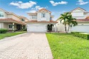 Golf and lake view gem in gated Doral Palms Estates! Enjoy for sale in Doral Florida Miami-Dade County County on GolfHomes.com
