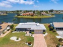 Take a look at this Newly Remodeled Spectacular Simmons Lake for sale in Sun City Center Florida Hillsborough County County on GolfHomes.com