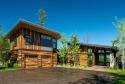 Spectacular custom-built home with beautiful views of Lake Coeur for sale in Harrison Idaho Kootenai County County on GolfHomes.com