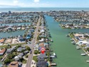 Water lovers and boaters, don't miss this one-story Treasure for sale in Treasure Island Florida Pinellas County County on GolfHomes.com