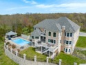 Situated on one of Red Hook's highest peaks with sweeping for sale in Red Hook New York Dutchess County County on GolfHomes.com