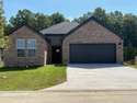 Incredible Ozark plan!  Indulge in the ultimate living for sale in Maumelle Arkansas Pulaski County County on GolfHomes.com