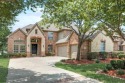 What an incredible opportunity to own your very own lake house for sale in The Colony Texas Denton County County on GolfHomes.com