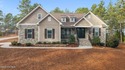 Prime location meets stunning lake views! This beautifully for sale in West End North Carolina Moore County County on GolfHomes.com