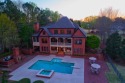 This custom-built European lakefront home is located in Oak for sale in Carrollton Georgia Carroll County County on GolfHomes.com