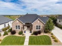 Step into this elegant home nestled in the prestigious Sanctuary for sale in Windsor Colorado Larimer County County on GolfHomes.com