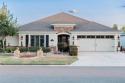 SHOW STOPPER! NOT a COOKIE CUTTER HOUSE; this house has for sale in The Villages Florida Sumter County County on GolfHomes.com
