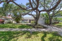 Stroll under the canopy oaks and through the courtyard to find for sale in St. Petersburg Florida Pinellas County County on GolfHomes.com