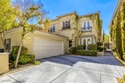 Inside exclusive gates of Canyon Gate, this elegant golf villa for sale in Las Vegas Nevada Clark County County on GolfHomes.com