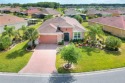 Welcome to this stunning 3-bedroom, 2-bathroom, 2-car garage for sale in Kissimmee Florida Polk County County on GolfHomes.com