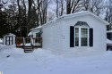 This beautifully maintained and updated home has 400 ft of for sale in Elk Rapids Michigan Antrim County County on GolfHomes.com