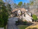 This gorgeous traditional home has it all!  Situated on 1.3 for sale in Woodstock Georgia Cherokee County County on GolfHomes.com