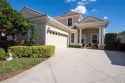 Step into luxury with this stunning pool home, graced with a for sale in Lakeland Florida Polk County County on GolfHomes.com