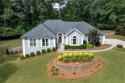 Exceptionally private 1+ acre setting ranch home w/ HUGE for sale in Lawrenceville Georgia Gwinnett County County on GolfHomes.com