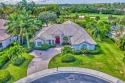 Exceptional pool home privately nestled on the 6th hole of Bear for sale in West Palm Beach Florida Palm Beach County County on GolfHomes.com