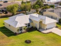 Welcome home to this well-maintained 3-bedroom, 2-bath gem for sale in Cape Coral Florida Lee County County on GolfHomes.com