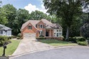 Tucked away at the end of a rare double cul-de-sac, this for sale in Suwanee Georgia Forsyth County County on GolfHomes.com