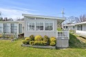 LOOKING FOR PARADISE? Let me take you through this stunning for sale in Greenport New York Suffolk County County on GolfHomes.com