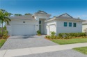 Indulge in the epitome of upscale living in your brand new for sale in Port Saint Lucie Florida Saint Lucie County County on GolfHomes.com