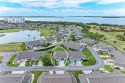 Nestled in the quaint town of Palmetto on the stunning Gulf for sale in Palmetto Florida Manatee County County on GolfHomes.com