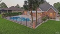 Stunning pool home with panoramic views of the 9th Fairway on for sale in Pace Florida Santa Rosa County County on GolfHomes.com