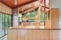 Calling all Mid-Century Modern lovers! Experience the epitome of for sale in Sanford North Carolina Lee County County on GolfHomes.com