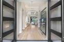 Welcome to this stunning modern residence nestled in an for sale in Miromar Lakes Florida Lee County County on GolfHomes.com