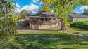 Nestled on the scenic Tiara Rado Golf Course, this unique for sale in Grand Junction Colorado Mesa County County on GolfHomes.com