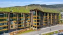 Welcome to your modern alpine retreat at Stowe's premier resort for sale in Stowe Vermont Lamoille County County on GolfHomes.com