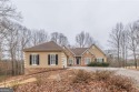 Welcome to this beautifully spacious ranch on a full finished for sale in Hiram Georgia Paulding County County on GolfHomes.com