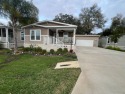 Very nice well maintained home, located in Water Oak Country for sale in Lady Lake Florida Lake County County on GolfHomes.com