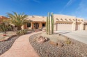 Experience the charm of a custom Santa Fe-style home in the for sale in Yuma Arizona Yuma County County on GolfHomes.com