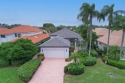 This home features relaxing water and golf views! It offers 3 for sale in Palm Beach Gardens Florida Palm Beach County County on GolfHomes.com