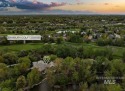 An extraordinary 1.5+ acre riverfront estate enveloped by water for sale in Eagle Idaho Ada County County on GolfHomes.com