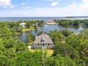 Welcome to your stunning waterfront retreat in Star Lake! for sale in Pensacola Florida Escambia County County on GolfHomes.com