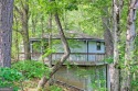 Tucked in Sky Valley's golf community, this tiny treehouse for sale in Dillard Georgia Rabun County County on GolfHomes.com