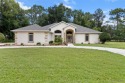 Beautifully decorated Citrus Springs Pool home with 3 bedrooms for sale in Citrus Springs Florida Citrus County County on GolfHomes.com