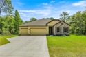 Gorgeous NEW 2024 4 Bedroom, 3 Bath, 3 CAR GARAGE Home with for sale in Beverly Hills Florida Citrus County County on GolfHomes.com