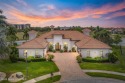 This meticulously crafted custom home, in the exclusive gated for sale in Melbourne Florida Brevard County County on GolfHomes.com