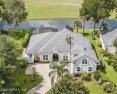 Welcome to your gated oasis nestled in the prestigious Queen's for sale in Jacksonville Florida Duval County County on GolfHomes.com