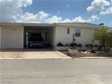 Charming and spacious home  on the golf course with a view of for sale in North Fort Myers Florida Lee County County on GolfHomes.com